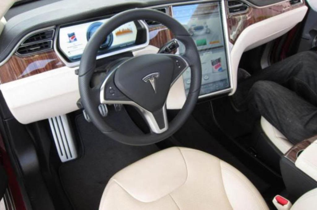 dangerous new car features lane distracting tesla dashboard